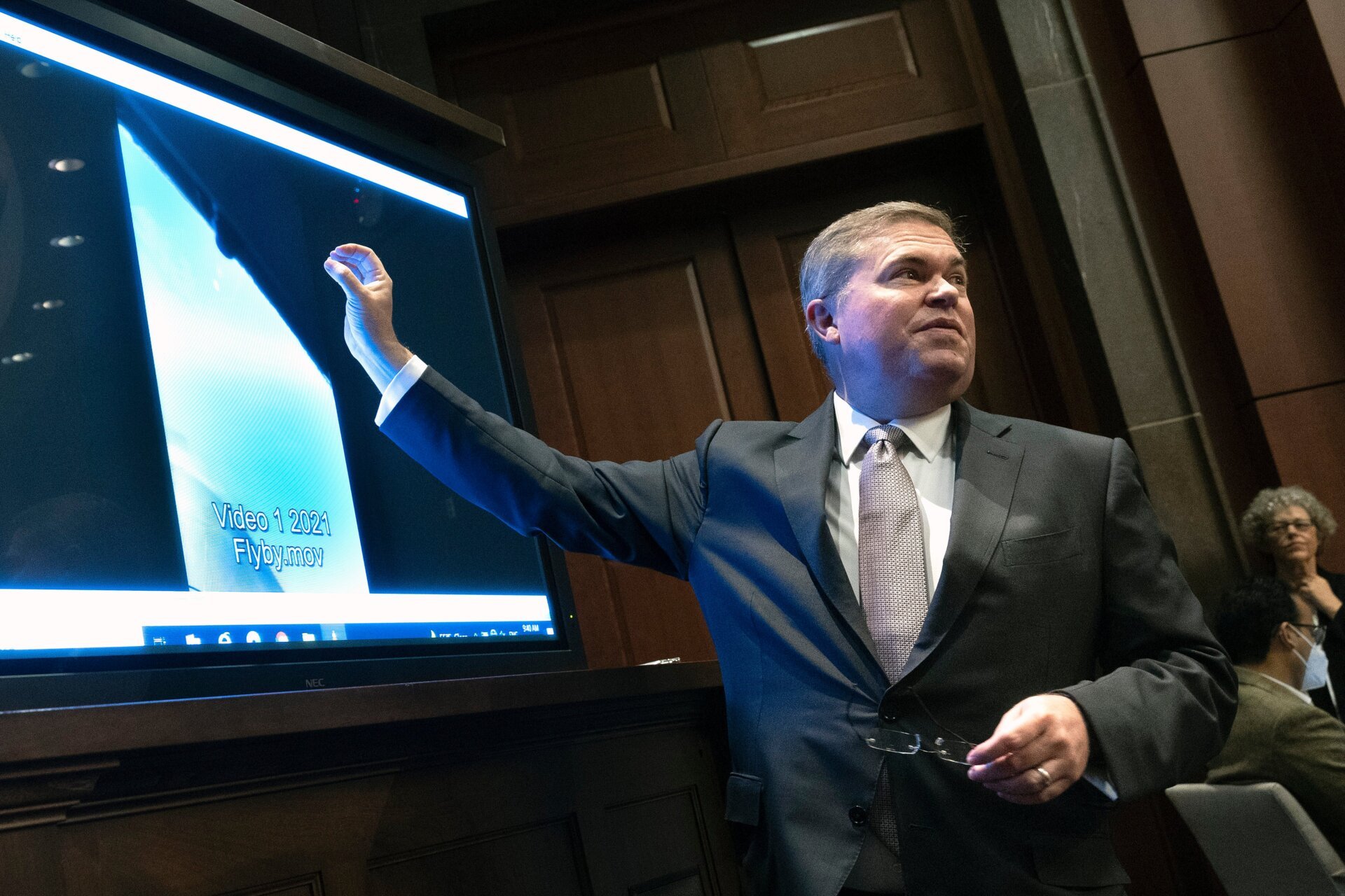 The U.S. Deputy Director of Naval Intelligence Scott Bray talks through a UAP video at a Congressional hearing.