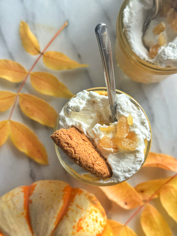 Creamy Ginger Pumpkin Mousse made with pumpkin, warm spices, fresh ginger, and homemade whipped cream. An easy, egg-free fall dessert perfect for Thanksgiving.