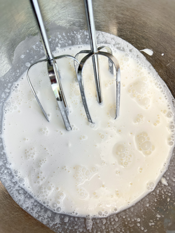 Creamy Ginger Pumpkin Mousse made with pumpkin, warm spices, fresh ginger, and homemade whipped cream. An easy, egg-free fall dessert perfect for Thanksgiving.
